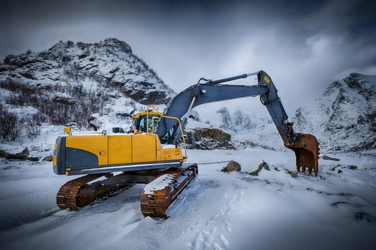 Old excavator in winter